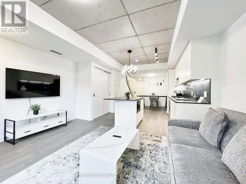 105 - 7 Watkinson Avenue, Toronto, ON - Indoor Photo Showing Living Room