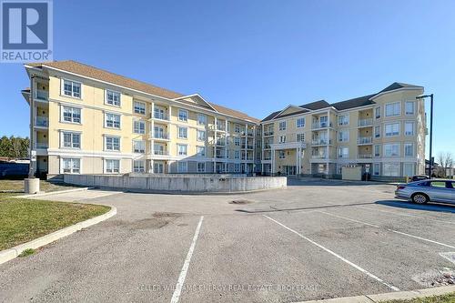 308 - 21 Brookhouse Drive, Clarington (Newcastle), ON - Outdoor With Balcony With Facade