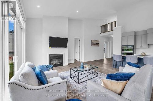 119 Sladden Court, Blue Mountains, ON - Indoor Photo Showing Living Room With Fireplace