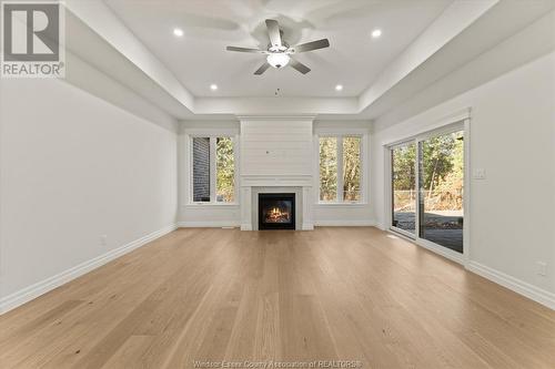 3255 Tullio Drive, Lasalle, ON - Indoor Photo Showing Living Room With Fireplace