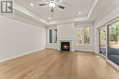 3255 Tullio Drive, Lasalle, ON - Indoor Photo Showing Living Room With Fireplace