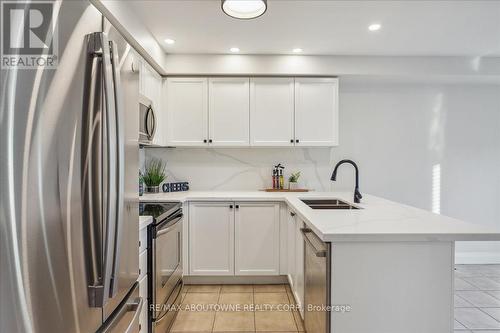 4880 Verdi Street, Burlington, ON - Indoor Photo Showing Kitchen With Stainless Steel Kitchen With Double Sink With Upgraded Kitchen