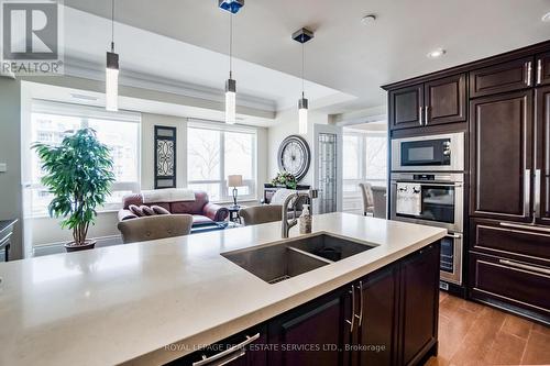 327 - 3500 Lakeshore Road W, Oakville, ON - Indoor Photo Showing Kitchen With Double Sink With Upgraded Kitchen