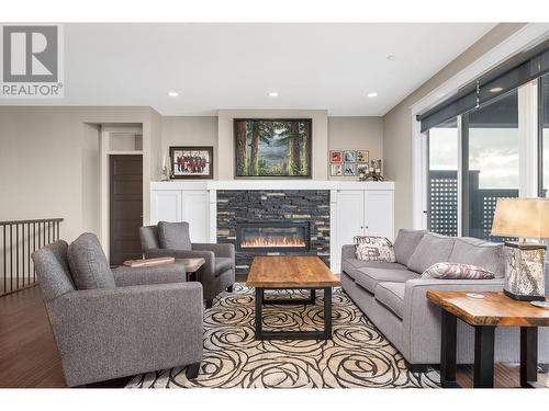 3916 Desert Drive, Vernon, BC - Indoor Photo Showing Living Room With Fireplace