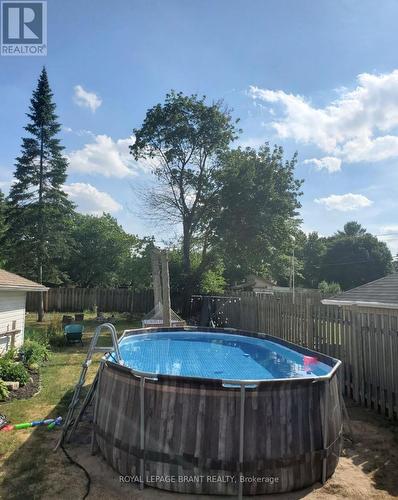 9 Alma Street, Brantford, ON - Outdoor With Above Ground Pool With Backyard