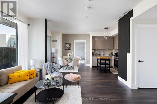 720 - 2450 Old Bronte Road, Oakville, ON - Indoor Photo Showing Living Room