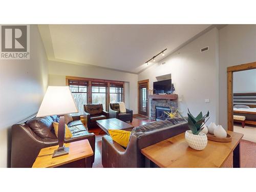 880 Dogwood Drive Unit# 405, Kimberley, BC - Indoor Photo Showing Living Room With Fireplace