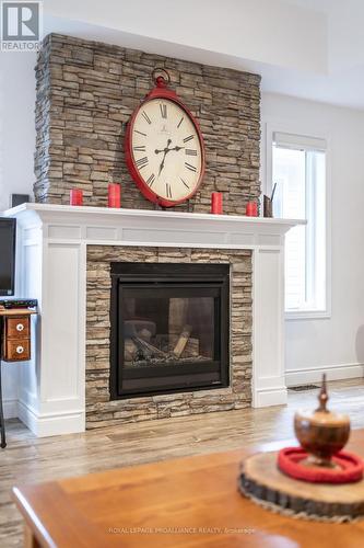 39 Cortland Way, Brighton, ON - Indoor Photo Showing Living Room With Fireplace