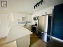 109 - 2040 Cleaver Avenue, Burlington, ON  - Indoor Photo Showing Kitchen With Stainless Steel Kitchen 