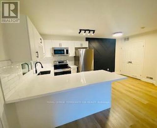 109 - 2040 Cleaver Avenue, Burlington, ON - Indoor Photo Showing Kitchen With Stainless Steel Kitchen