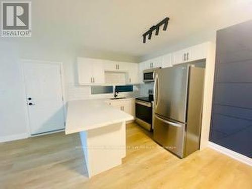 109 - 2040 Cleaver Avenue, Burlington, ON - Indoor Photo Showing Kitchen With Stainless Steel Kitchen