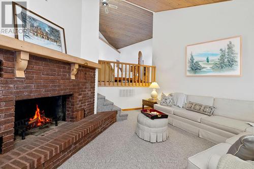 46 - 1211 Foreman Road, Muskoka Lakes, ON - Indoor Photo Showing Living Room With Fireplace