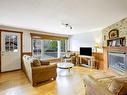 Salon - 2725 Rue Dufour, Sainte-Julienne, QC  - Indoor Photo Showing Living Room With Fireplace 