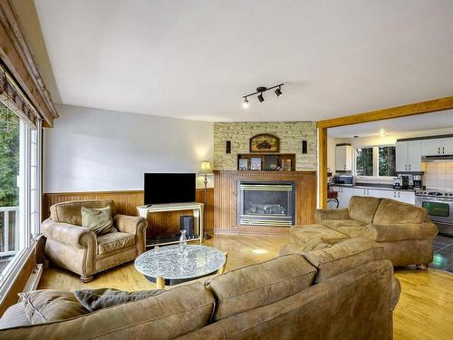 Salon - 2725 Rue Dufour, Sainte-Julienne, QC - Indoor Photo Showing Living Room With Fireplace