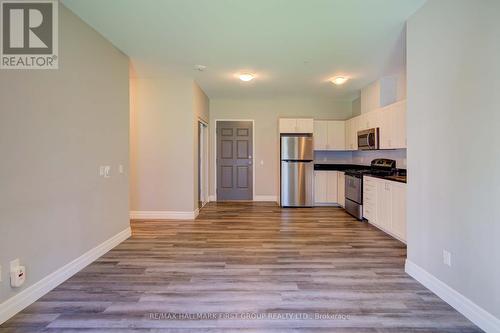 212 - 501 Frontenac Street, Kingston, ON - Indoor Photo Showing Kitchen With Stainless Steel Kitchen