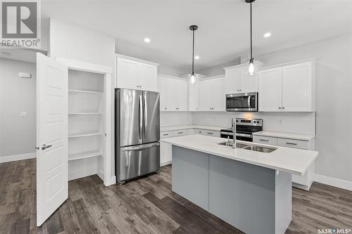 71 900 St Andrews Lane, Warman, SK - Indoor Photo Showing Kitchen With Double Sink