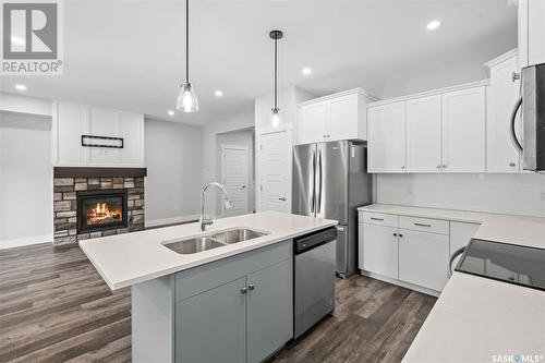 71 900 St Andrews Lane, Warman, SK - Indoor Photo Showing Kitchen With Double Sink With Upgraded Kitchen