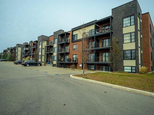 Parking - 303-400 Rue Du Maçon, Saint-Jérôme, QC - Outdoor With Balcony With Facade