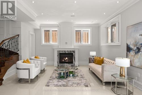 6 Harnish Crescent, Toronto, ON - Indoor Photo Showing Living Room With Fireplace