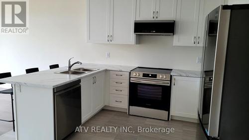 2135 Speare Court, Innisfil, ON - Indoor Photo Showing Kitchen With Double Sink