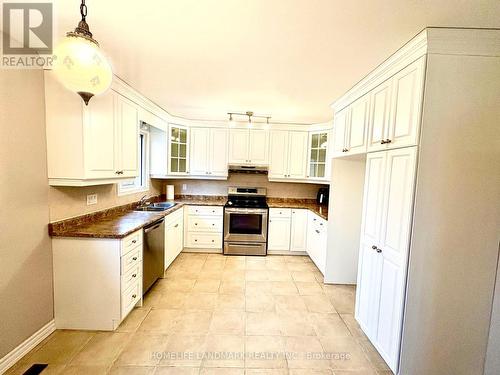 129 Glen Shields Avenue, Vaughan, ON - Indoor Photo Showing Kitchen With Double Sink