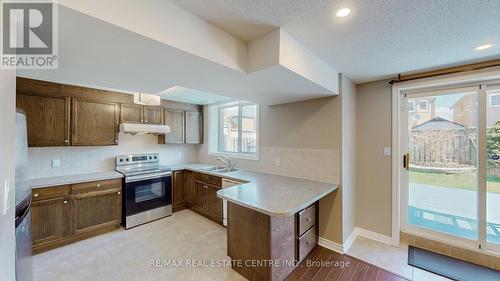 41 Springtown Trail N, Brampton, ON - Indoor Photo Showing Kitchen With Double Sink