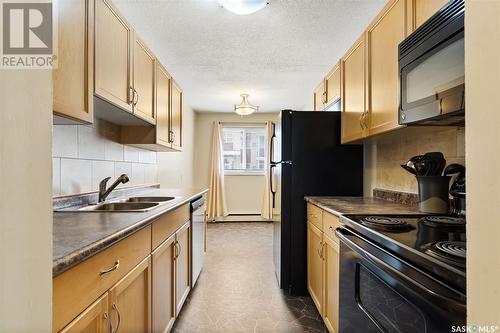 7 1811 8Th Avenue N, Regina, SK - Indoor Photo Showing Kitchen With Double Sink