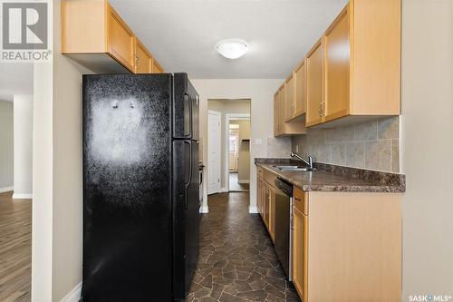 7 1811 8Th Avenue N, Regina, SK - Indoor Photo Showing Kitchen With Double Sink