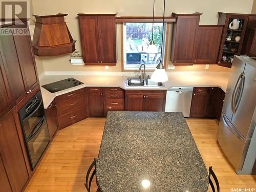 717 3Rd Avenue W, Meadow Lake, SK - Indoor Photo Showing Kitchen With Double Sink