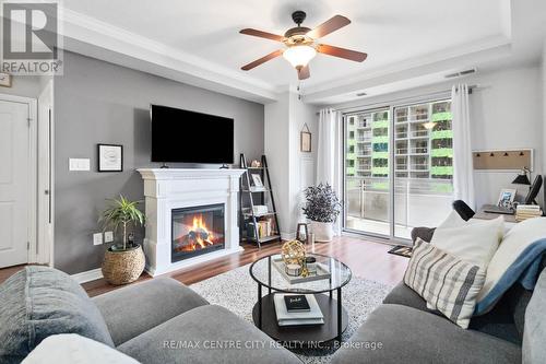 314 - 1030 Coronation Drive, London, ON - Indoor Photo Showing Living Room With Fireplace