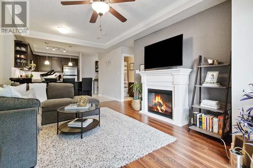 314 - 1030 Coronation Drive, London, ON - Indoor Photo Showing Living Room With Fireplace