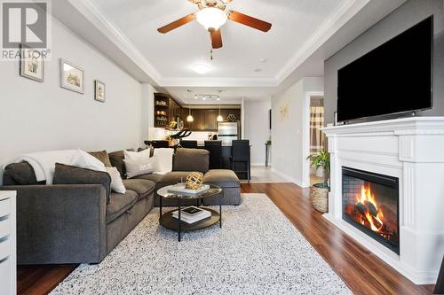 314 - 1030 Coronation Drive, London, ON - Indoor Photo Showing Living Room With Fireplace