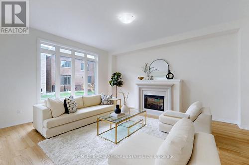 31 Sambro Lane, Whitchurch-Stouffville, ON - Indoor Photo Showing Living Room With Fireplace