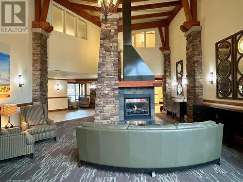 400 Stemwinder Drive Unit# 414, Kimberley, BC - Indoor Photo Showing Living Room With Fireplace