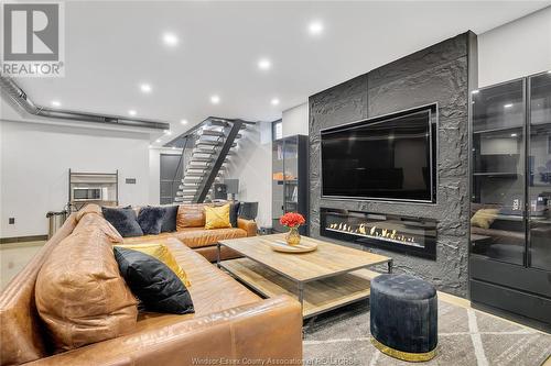 10650 Riverside Drive East, Windsor, ON - Indoor Photo Showing Living Room With Fireplace