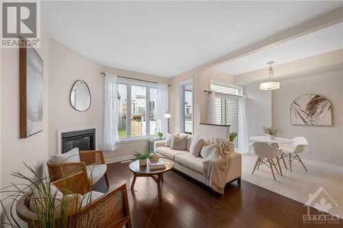 723 Teasel Way, Ottawa, ON - Indoor Photo Showing Living Room With Fireplace