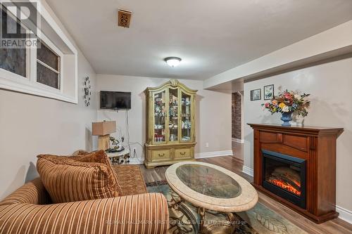 128 Shropshire Drive, Toronto, ON - Indoor Photo Showing Living Room With Fireplace