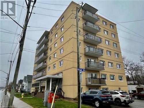 View of building exterior - 810 Main Street W Unit# 302, North Bay, ON - Outdoor With Balcony