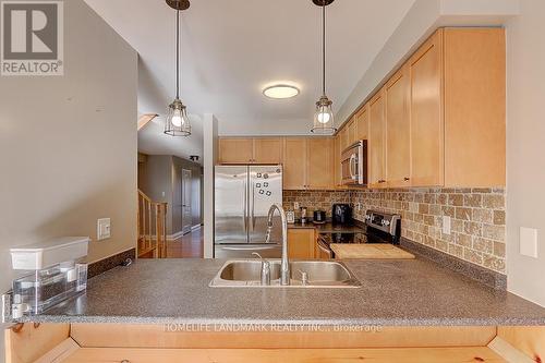 227 Venice Gate Drive, Vaughan, ON - Indoor Photo Showing Kitchen With Double Sink