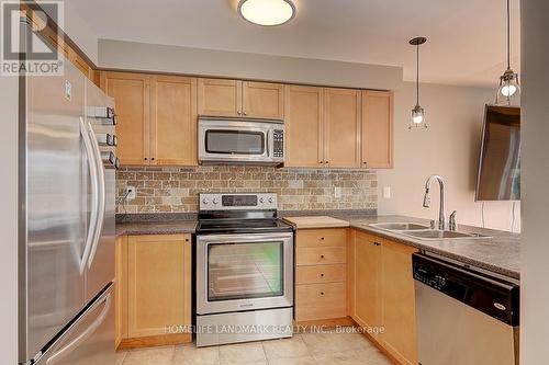 227 Venice Gate Drive, Vaughan, ON - Indoor Photo Showing Kitchen With Double Sink