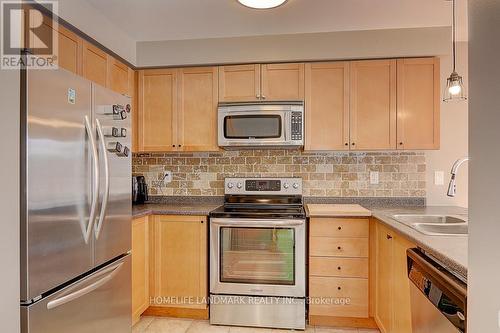 227 Venice Gate Drive, Vaughan, ON - Indoor Photo Showing Kitchen With Double Sink