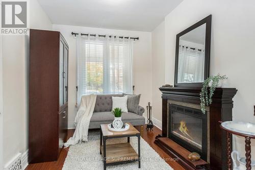 8 Blakley Avenue, Toronto, ON - Indoor Photo Showing Living Room With Fireplace