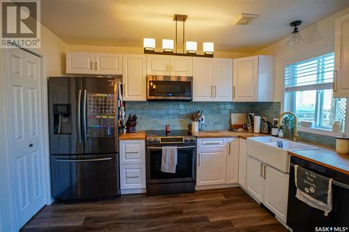 102 Blakeney Crescent, Saskatoon, SK - Indoor Photo Showing Kitchen With Stainless Steel Kitchen With Double Sink