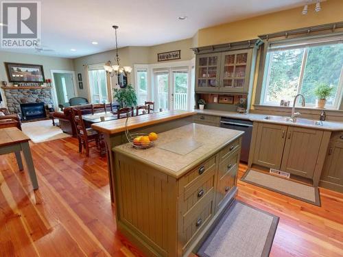 3415 Theodosia Ave, Powell River, BC - Indoor Photo Showing Kitchen With Fireplace With Double Sink