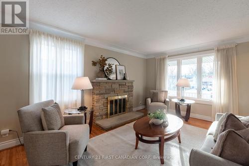 348 Kenmore Place, London, ON - Indoor Photo Showing Living Room With Fireplace