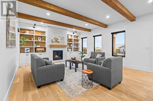 119 Field Street, Lambton Shores (Forest), ON - Indoor Photo Showing Living Room With Fireplace