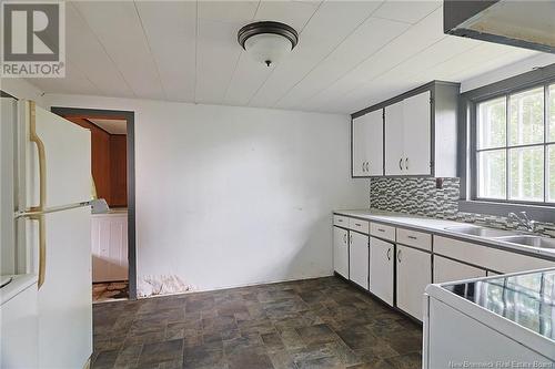 327 Canada Street, Marysville, NB - Indoor Photo Showing Kitchen With Double Sink