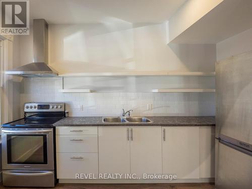 1 - 116 Myrtle Avenue, Hamilton, ON - Indoor Photo Showing Kitchen With Double Sink