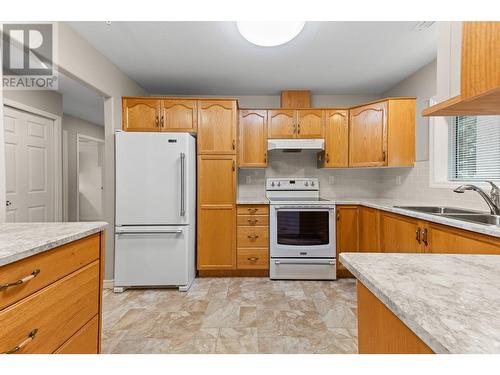 2245 Atkinson Street Unit# 101, Penticton, BC - Indoor Photo Showing Kitchen With Double Sink