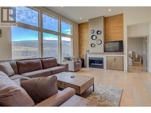 8010 Graystone Drive, Coldstream, BC - Indoor Photo Showing Living Room With Fireplace